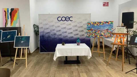 Subasta solidaria en la comida navide&ntilde;a de COEC. (COEC)